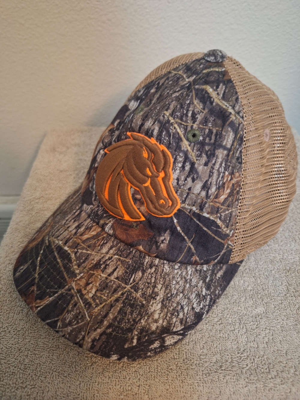 BSU Broncos Camo Trucker Hat with Orange Bromco Patch